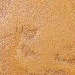 Rostfarbene Metalleffektlasur auf geflecktem Feinputz